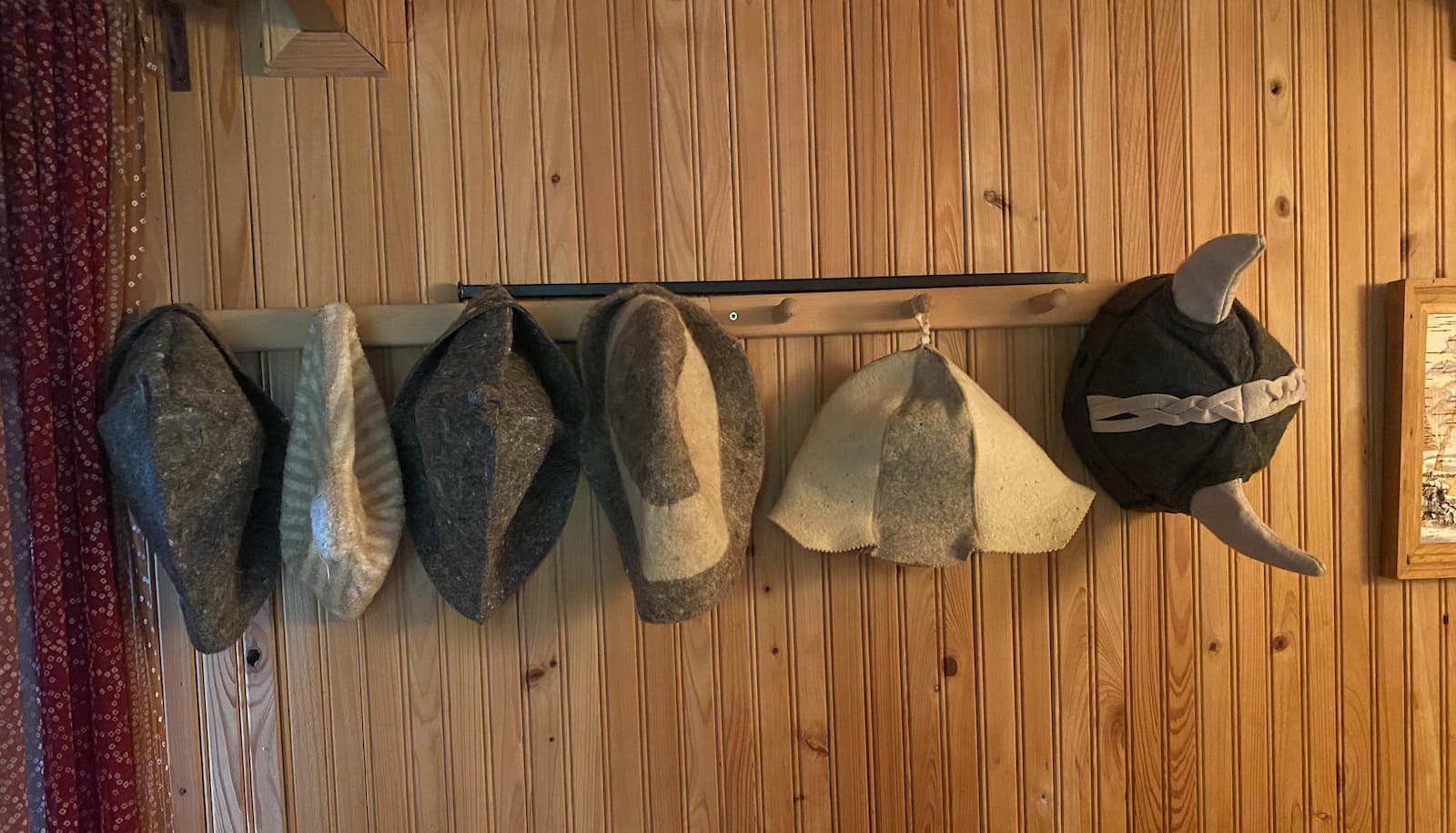 Felt banya hats hanging on the wall